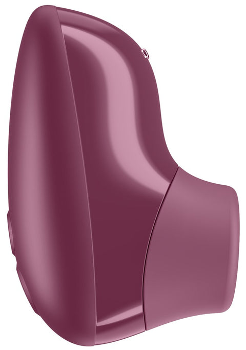 Womanizer Snap met geopend oplaadcase
